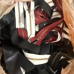Bag of different colored zippers for sewing