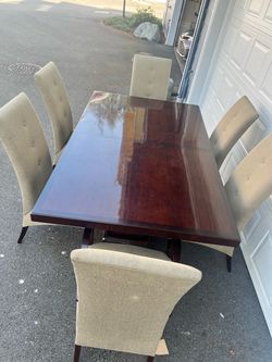 Dining room table with 6 chairs, leaf and side board