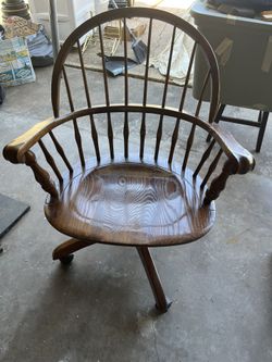 CHAIR 25"wide x 22"deep; it has wheels and it leans back; I don't think it goes higher or lower, it does have a flaw;  cross streets are Arapaho & Wat