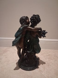 Estatua bronce