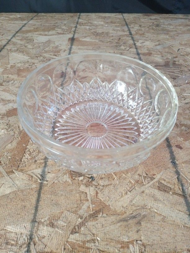 Arcoroc crystal glass bowl, likely from France, known for its distinctive diamond-cut and starburst patterns. 