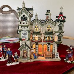 Christmas Village With Three Figurines