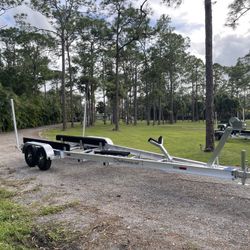 New 2026 Trailer Mania 11K GVWR Dual A Ps Boat Traiier.  25-27ft Model. 