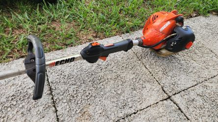Echo Trimmer Weed Eater with a speed feed head