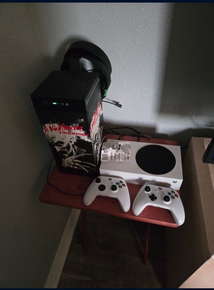 Both Xbox Series With Remotes