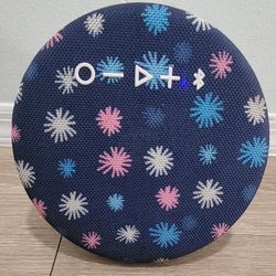 ONN. PORTABLE BLUETOOTH SPEAKER IPX4 WATER RESISTANT, ROUND WIRELESS,  SPEAKER, NAVI SPARK