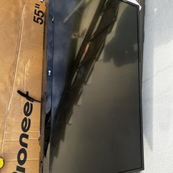 LG TV w/ installed wall bracket 