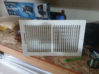 White metal vent cover