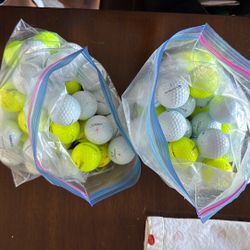 66 Titleist & TaylorMade Golf balls - Great Condition! 