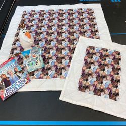 New hand quilted Frozen lap blanket, new Olaf plush and book and small blanket for Olaf, new sticker book. Easter gift basket