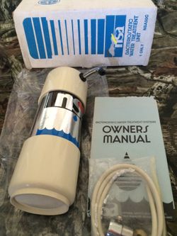 NEW. Countertop bacteriostatic water filter