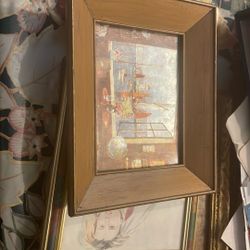 Iridescent picture of sailboats and lighthouse