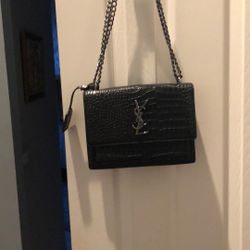 YSL Embossed Leather https://offerup.com/redirect/?o=QmFnLk5ldw==