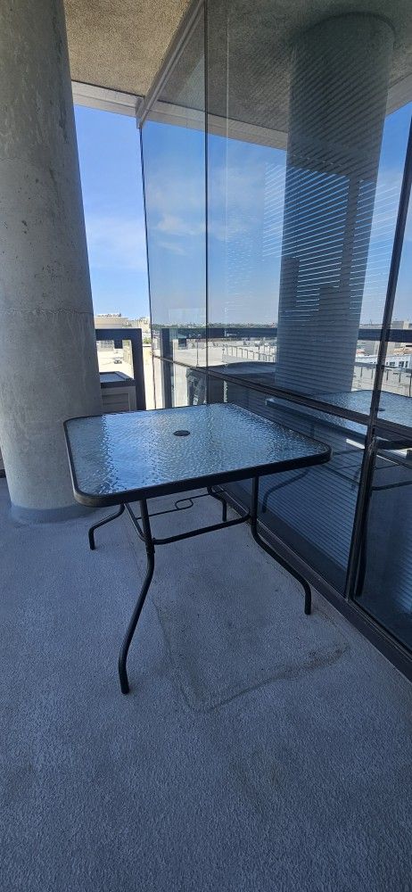 GLASS PATIO TABLE