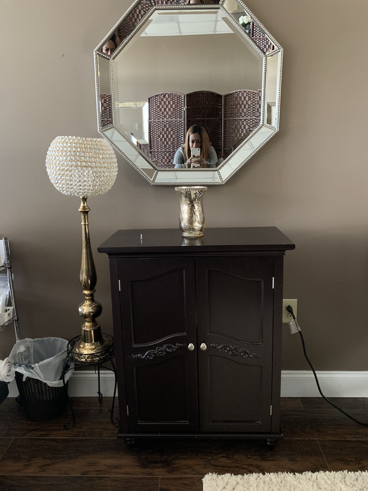 Octagon mirrors and storage cabinet