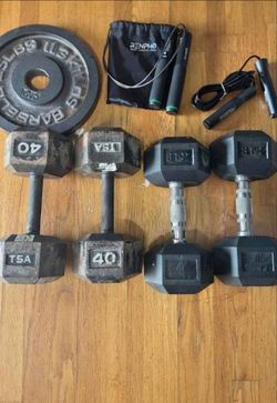 Dumbells set of 40s and 25s with two jump ropes and a 25lb plate