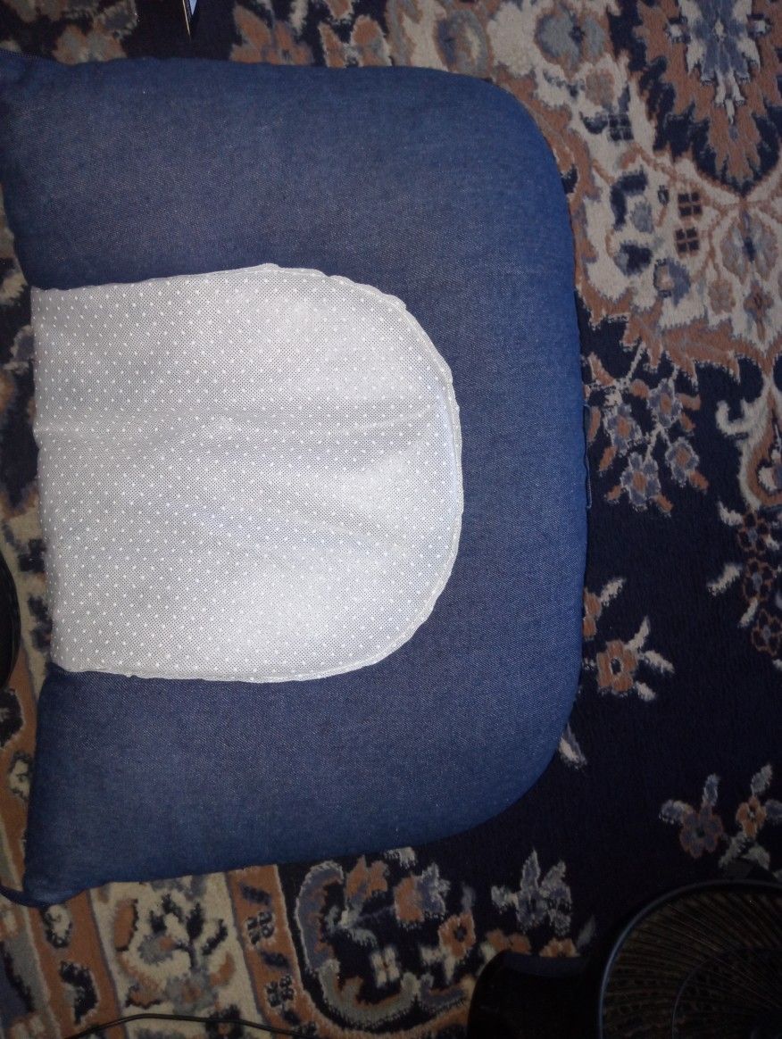 Woombie Swaddle Snuggle Sleep Portable Baby Bed.