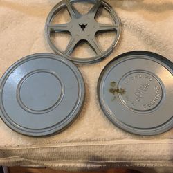 This is a 5” diameter 8mm film canister with empty reel. Reel reads