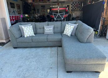 Perfect shape living spaces gray sectional couch !!