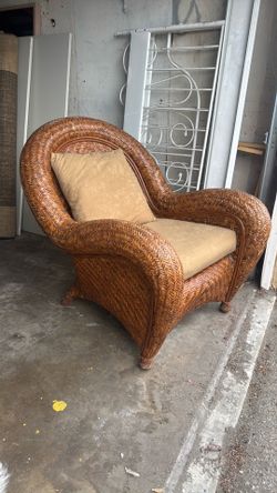 Wicker chair with cushions