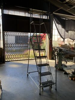 Uline 7 Step Narrow Aisle Rolling Ladder 100” Tall