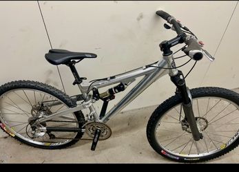 Small full suspension Jamis mountain bike polished alloy