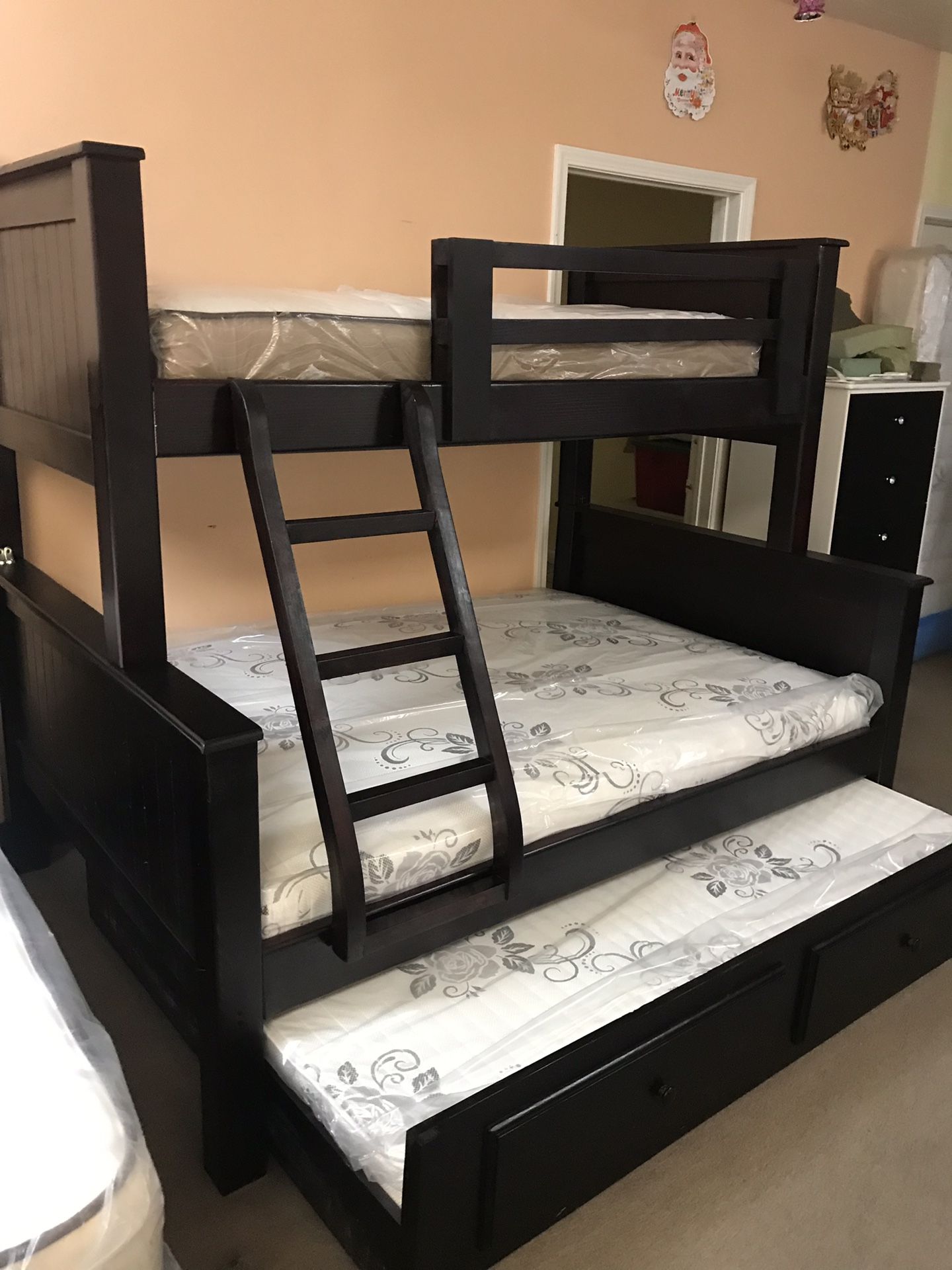 Brand new bunk bed twin twin full with mattresses and trundle included as seen