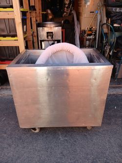Stain and steel roller ice chest
