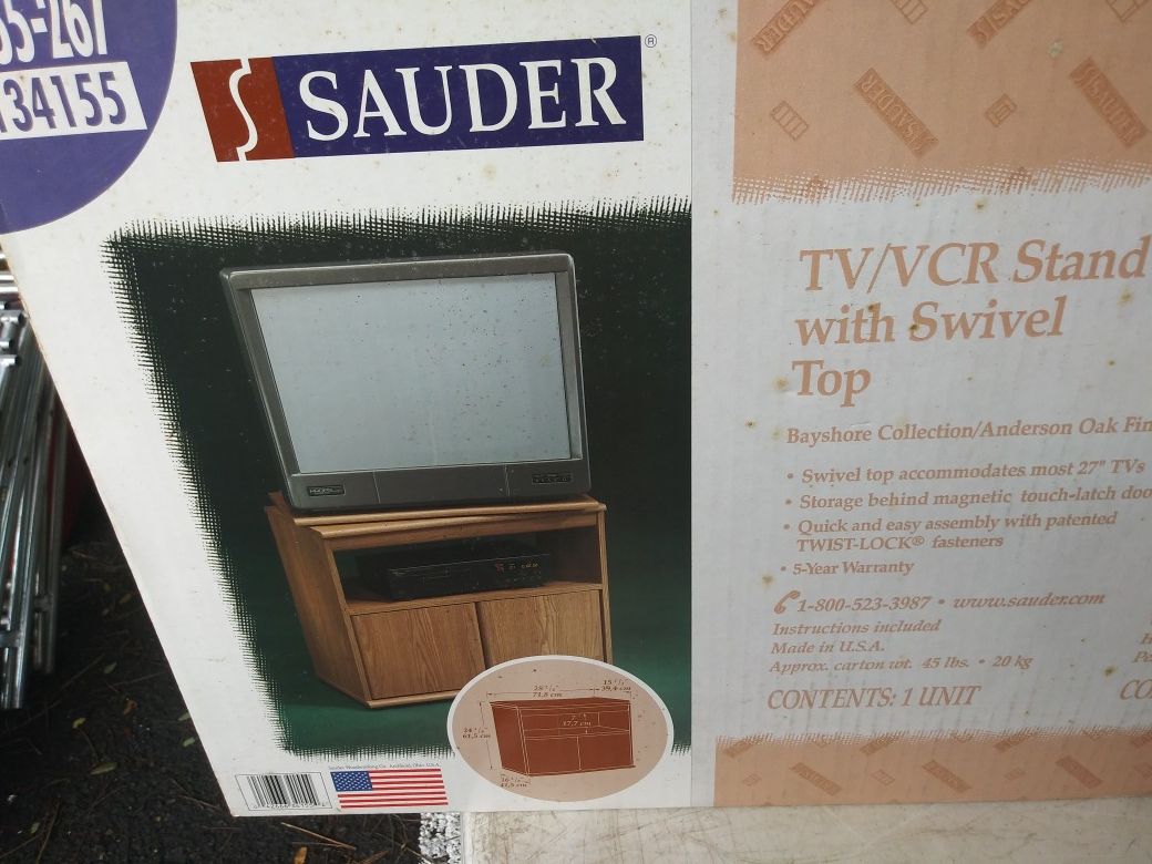 Brand new in box Sauder TV\VCR stand with swivel to