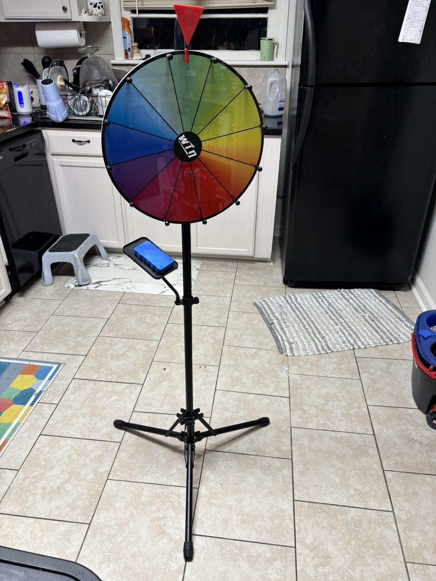 Two Spinning Game Wheels $54 For Large W/stand, $28 For Small.