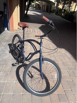 Man’s beach cruiser new with scrapes from delivery
