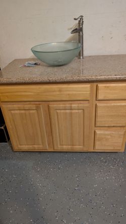 Bathroom cabinet sink and faucet