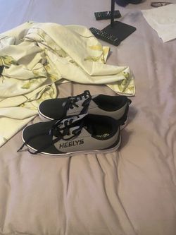 Men’s shoes with the roller blade, size 11