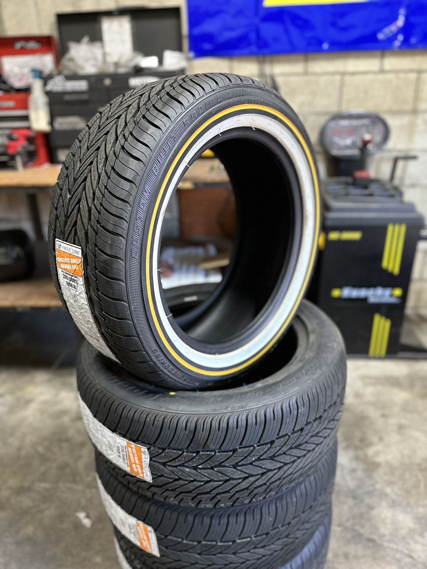 New Set Of (4) 235/50R17 Vogue Tire Custom Radial Gold & White Wall