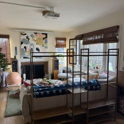 Walnut Standing Clothing Rack With Shelves And Rods