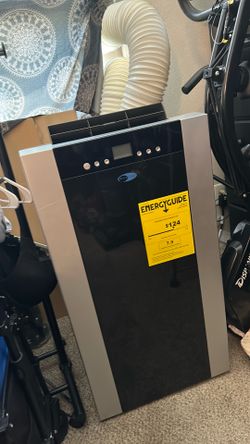 Portable air conditioner, practically new