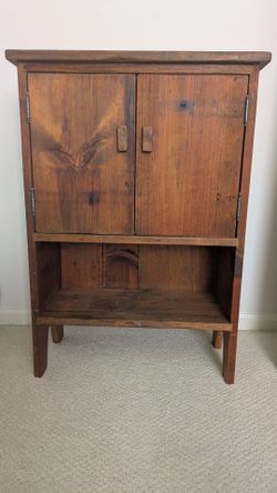 Decorative small wood cabinet