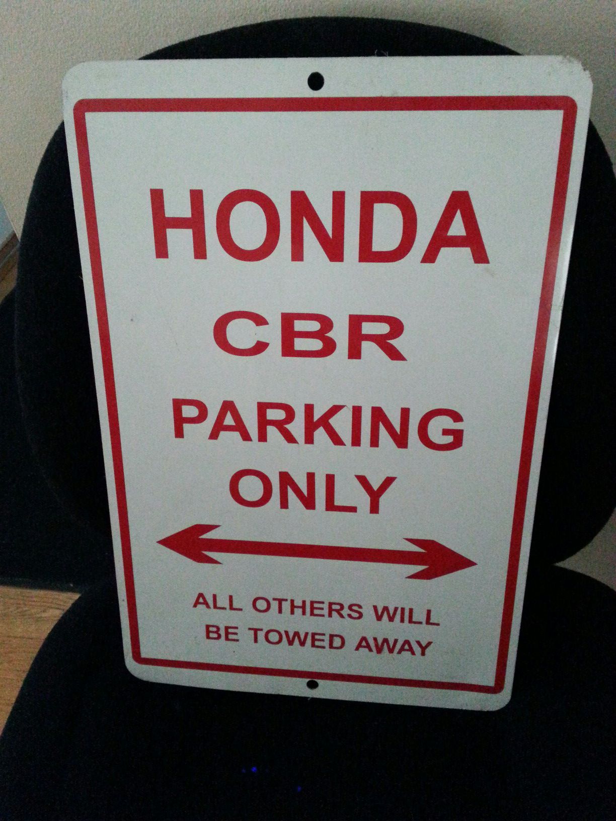 Sport bike parking sign. Honda CBR