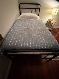 Twin size bed frame and mattress