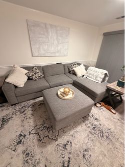 Super comfy gray couches with ottoman