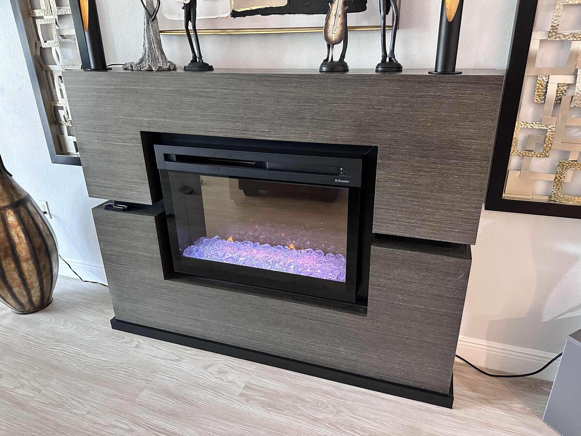 Beautiful Ambient Lighted Fireplace by Dimplex In Wall Cabinet