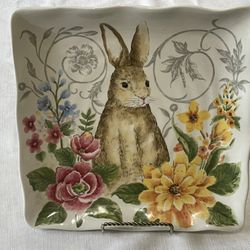 Maxcera Spring Collection ceramic plate featuring a rabbit and floral design. 11”x 11”