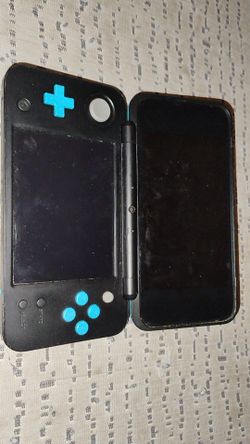 Nintendo 3ds something, I bought it like 4 or 3 years ago at GameStop, I'm pretty sure I have the charger somewhere.