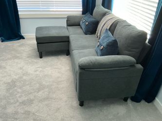 Small couch barely used   65 or best offer