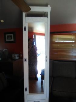 I sell an antique piece of furniture that measures tall, tall 8 feet, width 19 inches.