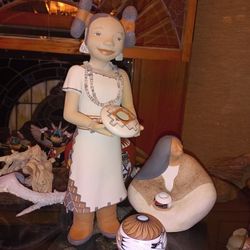 Kathleen walls Girl Holding Pottery
