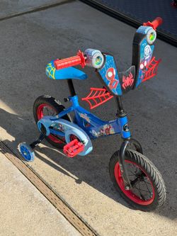 Huffy 12” spider and friends boys bike with training wheels $45 OBO