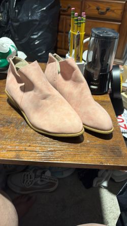 Pink low cut boots.