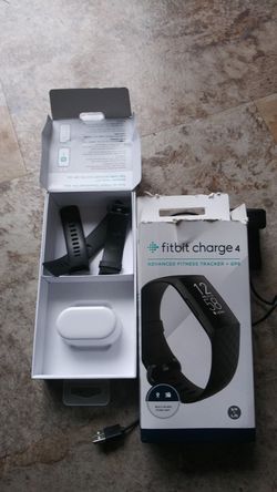 Fitbit charge 4 just out the box. Box is open but fitbit never used
