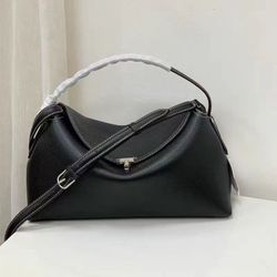 Toteme T-lock leather top handle bag